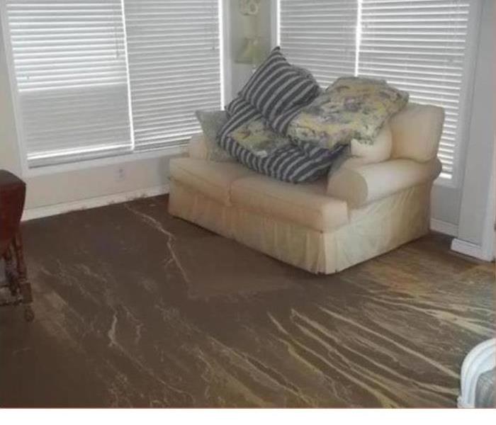 Wind storm brought sand into this living room 