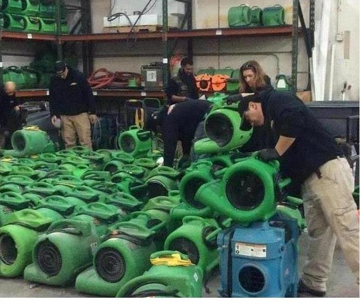 SERVPRO cleaning their equipment at their warehouse